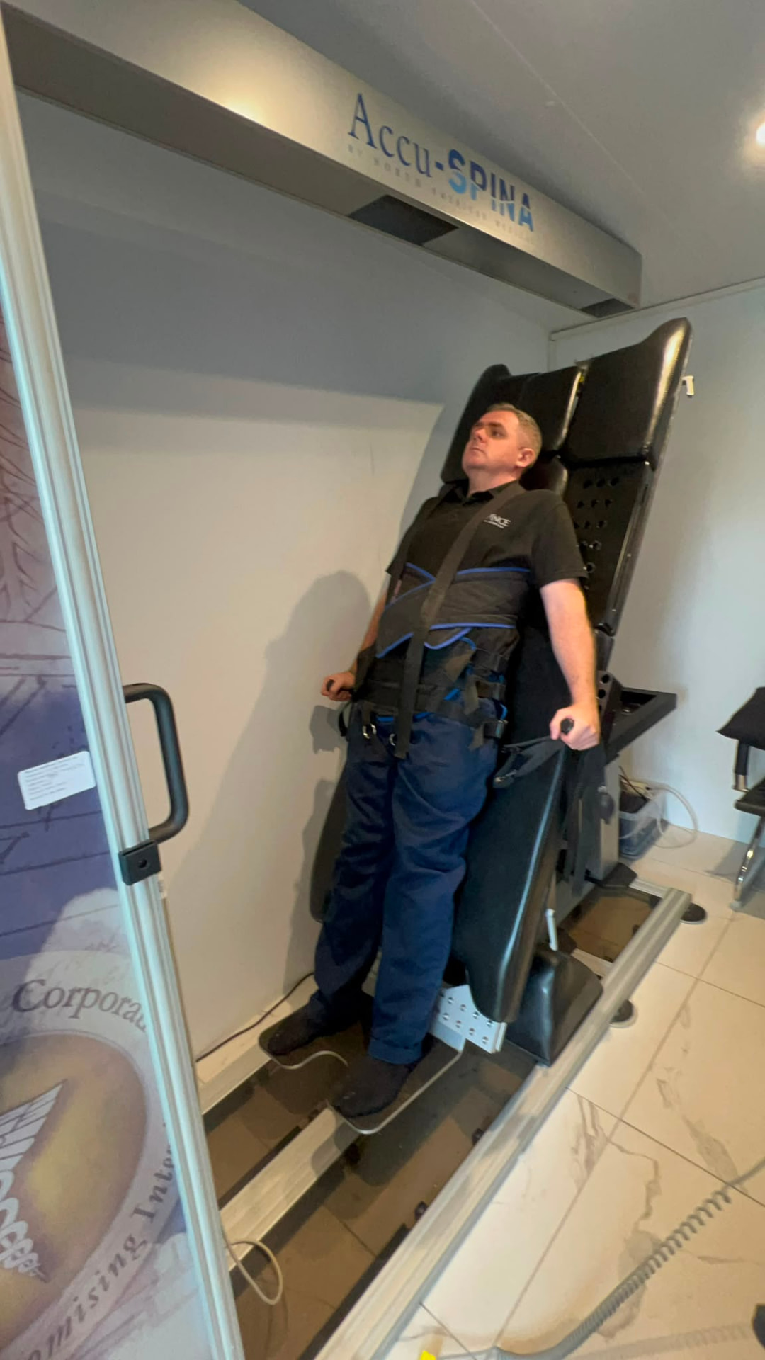 Patient receiving IDD Therapy on the Accu-SPINA machine
